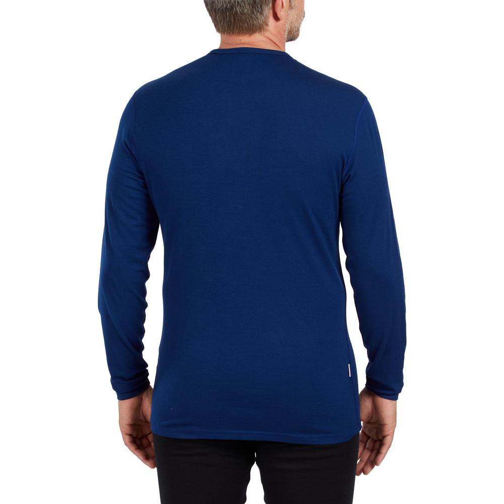 A man models the microweight long sleeved merino wool base layer crew neck top, back view #color_navy