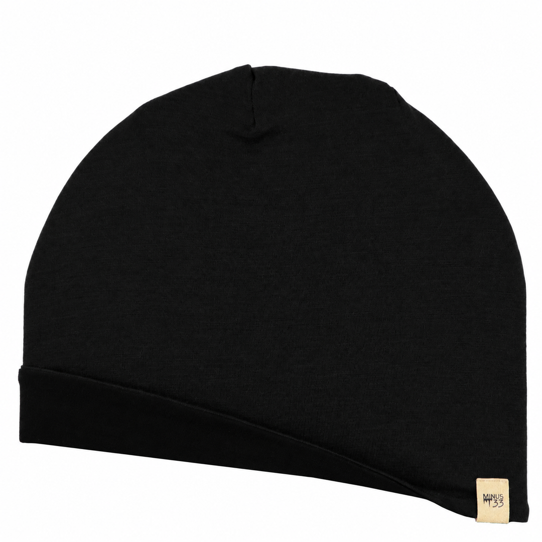 Flat Lay image of the microweight beanie in the color black. 