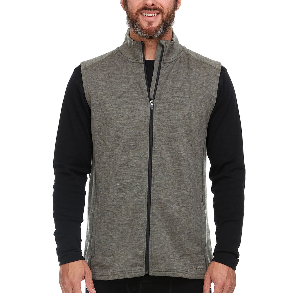 A man models the heavyweight merino wool full-zip vest, front view #color_granite-green