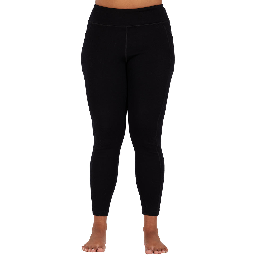 womens black expedition weight leggings front profile with pockets #color_black