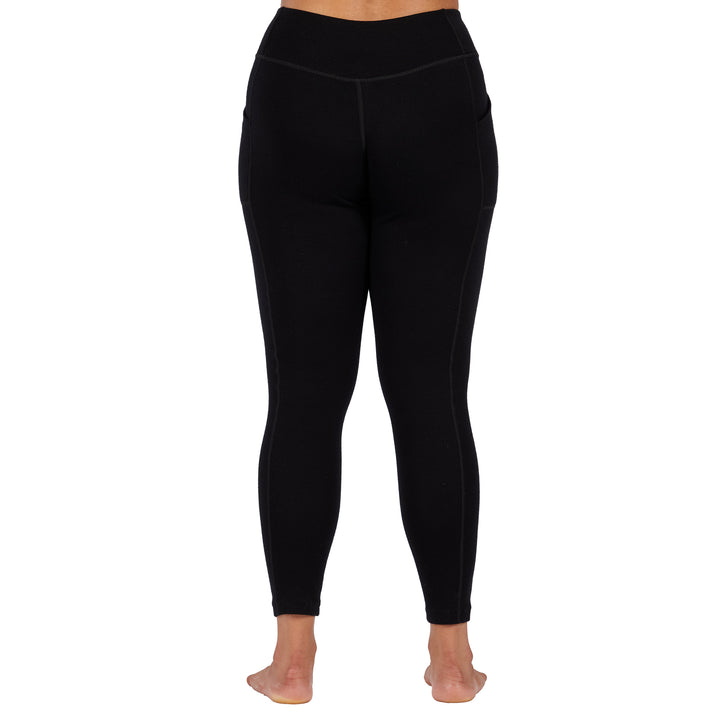 womens black expedition weight leggings back profile with pockets 