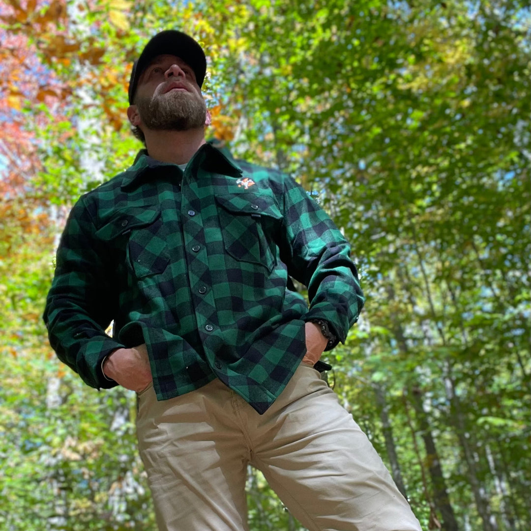 Brad showing off the Big Woods Bucks Plaid Shirt #color_green-plaid